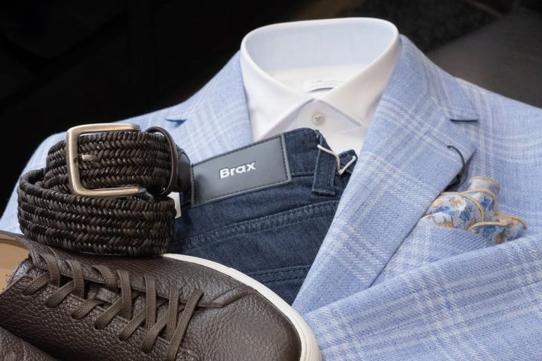 Men's casual ensemble with white button shirt, blue plaid suit jacket, Brax denim, leather belt and loafers
