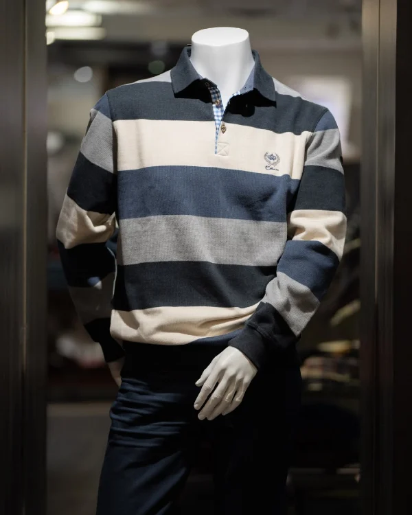 Interior display showing casual men's polo shirt with jeans
