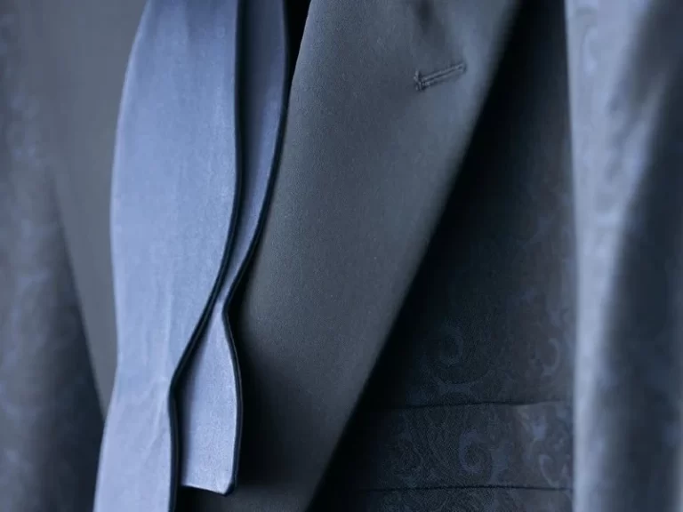 Closeup of form suit jacket and tie