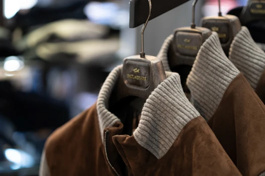Men's outerwear jackets on hangers