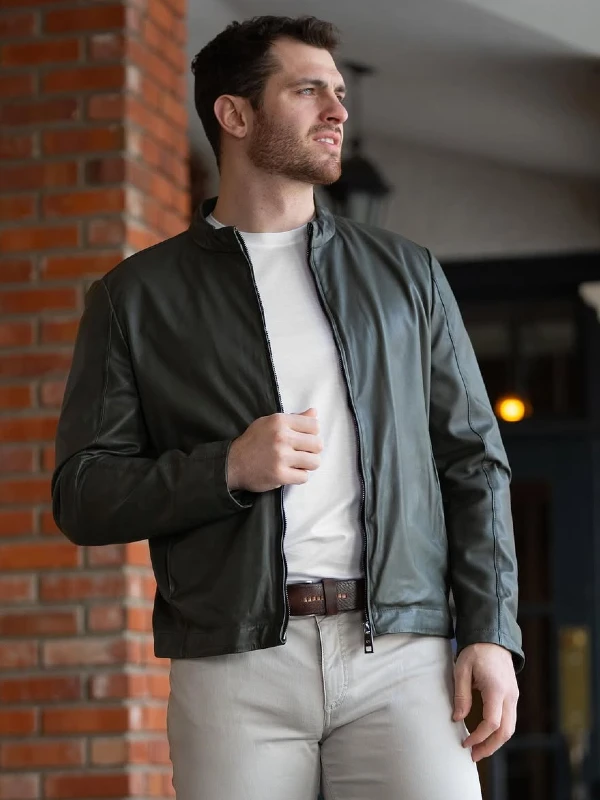 Man standing outside wearing leather jacket