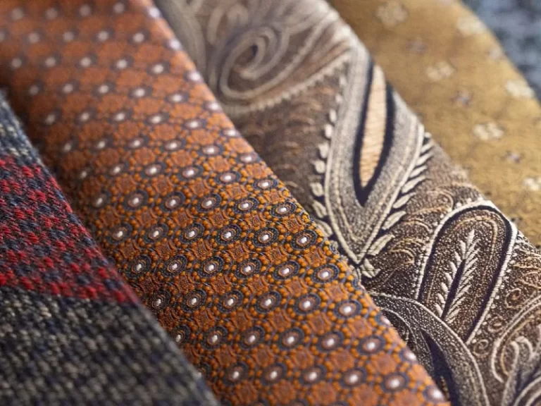 Closeup of fine, textured, patterned ties