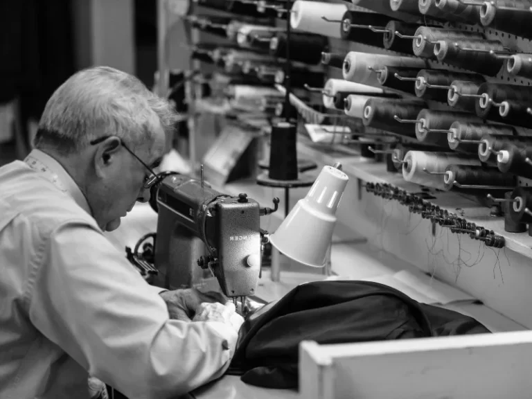 Master tailor working at a sewing machine